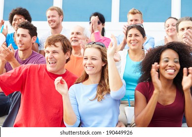 Spectators Cheering At Outdoor Sports Event