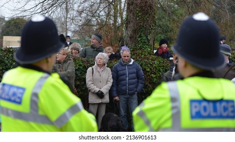 Spectators Gather To Watch The Traditional Boxing Day Hunt As Police Stand Guard On December 26, 2013 In Chippenham, UK. Fox Hunting Is Outlawed In The UK With Meets Following Scented Trails.