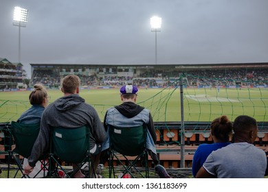 Spectators Watching Cricket Match