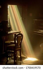 spectrum of light through a window into a dark room