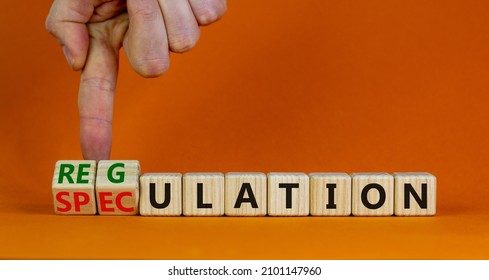 Speculation or regulation symbol. Businessman turns wooden cubes, changes the word speculation to regulation. Beautiful orange background, copy space. Business, speculation or regulation concept. - Shutterstock ID 2101147960