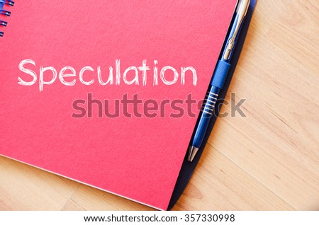 Speculation text concept write on notebook with pen