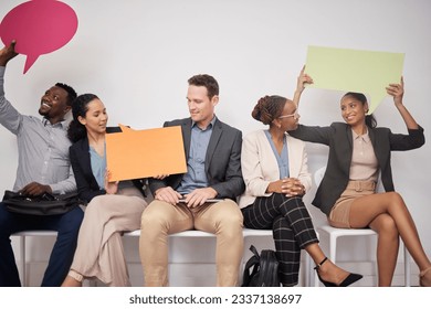 Speech bubble, business people and diversity group on social media for voice, opinion or advertising feedback in studio. Happy employees, vote and survey of hiring, HR recruitment and sign to join us