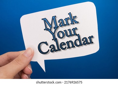 Speech Bubble In Front Of Colored Background With Mark Your Calendar Text.