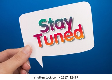 Speech Bubble In Front Of Colored Background With Stay Tuned Text.