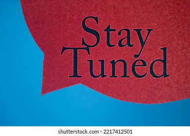 Speech Bubble In Front Of Colored Background With Stay Tuned Text.