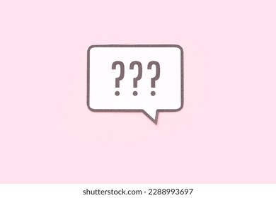 Speech bubble with question mark on pink background