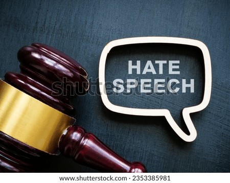 Speech bubble with sign hate speech and a gavel.