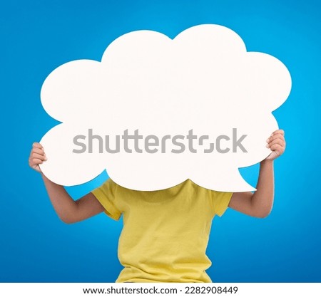 Speech bubble space, thinking and child with idea, opinion and news announcement on blue background studio. Talking, social media mockup and kid with board, poster or cardboard banner for information