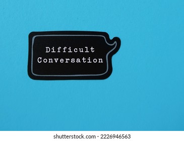 Speech sticker on blue copy space background with text DIFFICULT CONVERSATION concept of request to have serious talk in sensible subjects at work or relationship, discuss personal issues conflict - Shutterstock ID 2226946563