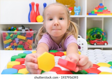 Speech Therapy, The Development Of Fine Motor Skills. Girl Playing Puzzle, Happy Child