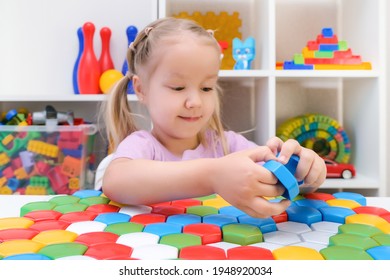 Speech Therapy, The Development Of Fine Motor Skills. Girl Playing Puzzle, Happy Child