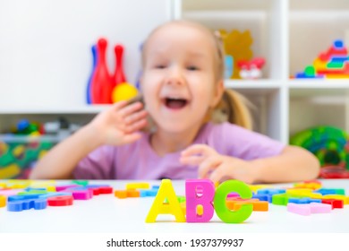 Speech Therapy. Toddler Girl With Letters. Classes With A Speech Therapist. Abc