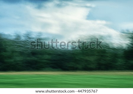 Golf Flag on Pristine Green at Sunset surrounded by lush trees in the warm glow of sunset. Perfect for illustrating the beauty of golf, nature, and serene outdoor sports.