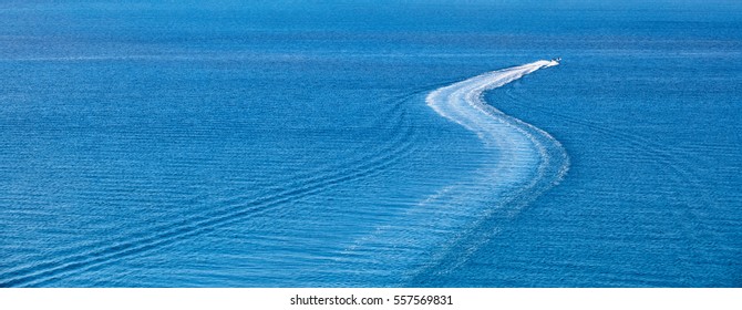 Speed Boat Making Curve In Ocean