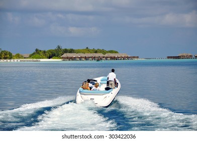 Speed boat with tourists in the Maldvies