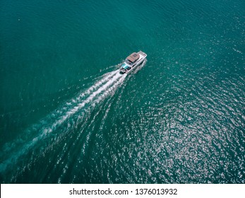 Speed Boat/ Yacht At Sea Leaving A Wake, Aerial View