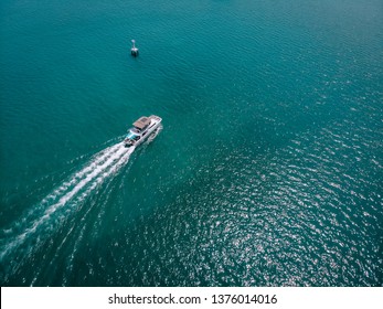 Speed Boat/ Yacht At Sea Leaving A Wake, Aerial View