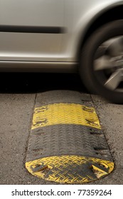 Speed Bump On A Road When A Car Is Passing