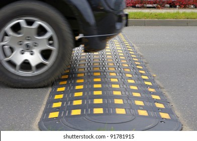 Speed Bump On A Road When And Car