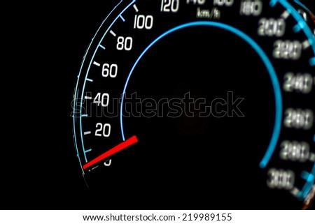 Speed control dashboard in modern luxury car, macro view