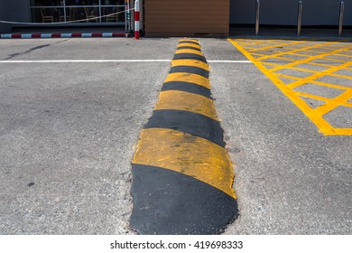 Speed Hump Yellow and black, made of asphalt.