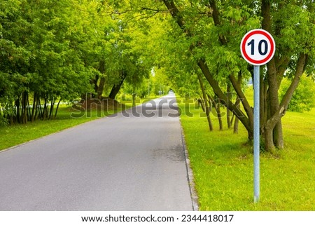 speed limit road sign in the park. speed limit 10 kilometers per hour. speed limits in the park