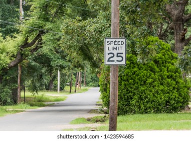 Speed Limit Sign On A Road 25 Mph