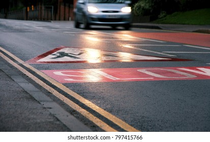 The speed limit signage on the asphalt road, slow, at school zone, safety area