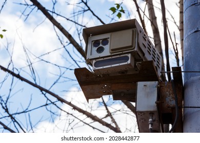 Speed radar camera detector mounted on the pole front closeup telephoto view