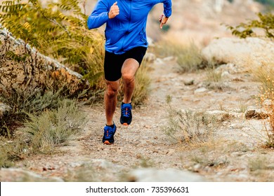 Speed Running On Mountain Trail Male Athlete Runner