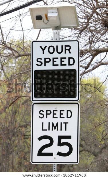 Speed sign with solar\
powered display