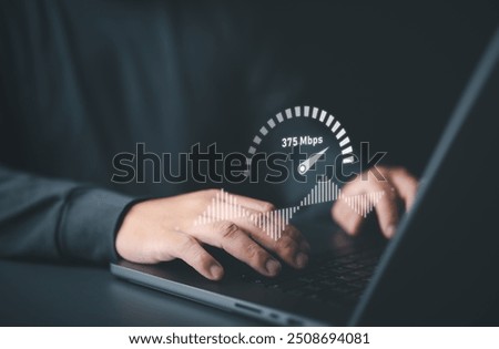Speed test for internet network connection. Man using a laptop computer to benchmark check wireless networking or 5G cellular Mbps or Gbps speed quality. WiFi 7 download or upload transfer rate.