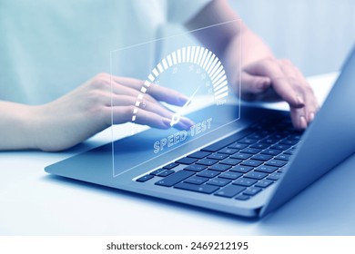 Speed test. Woman using laptop at table, closeup. Virtual screen over device - Powered by Shutterstock