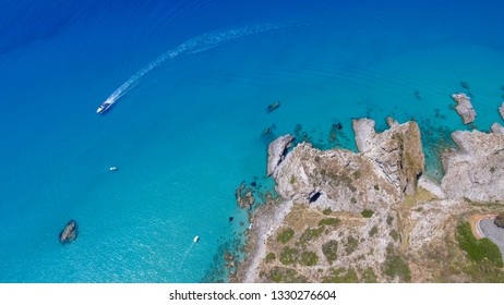 Speedboat In A Beautiful Ocean Near The Coastline, Overhead Aerial View, Holiday Concept.