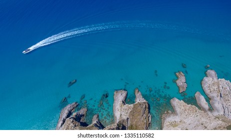 Speedboat In A Beautiful Ocean Near The Coastline, Overhead Aerial View, Holiday Concept.