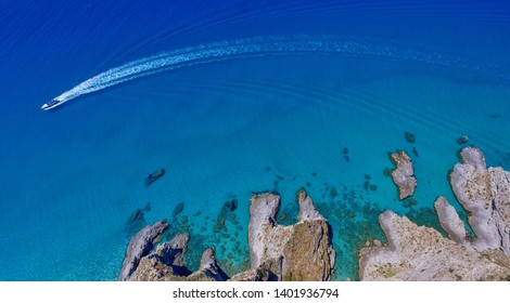 Speedboat In A Beautiful Ocean Near The Coastline, Overhead Aerial View, Holiday Concept.