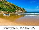 Speedboat on the sand of Bonete beach on the island of Ilhabela on the coast of Sao Paulo