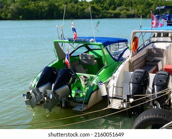 
Speedboats Lined Up. Speedboat Engine With Stainless Propellers. 