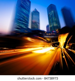 Speeding Car Through The Street Of Shanghai China In Night.