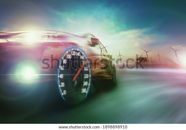 Speeding EV car with\
speedometer. Low angle side view of car driving fast on motion\
blur, Double exposure