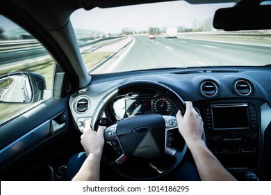 Speeding on a highway - point of view, first person perspective - Shutterstock ID 1014186295