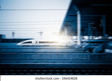 Speeding Train Away From Railway Station, Shanghai China.