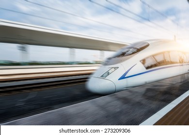 Speeding Train Away From Railway Station, Shanghai China.