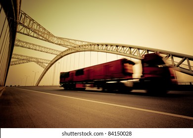 Speeding Truck Go Through The Bridge.