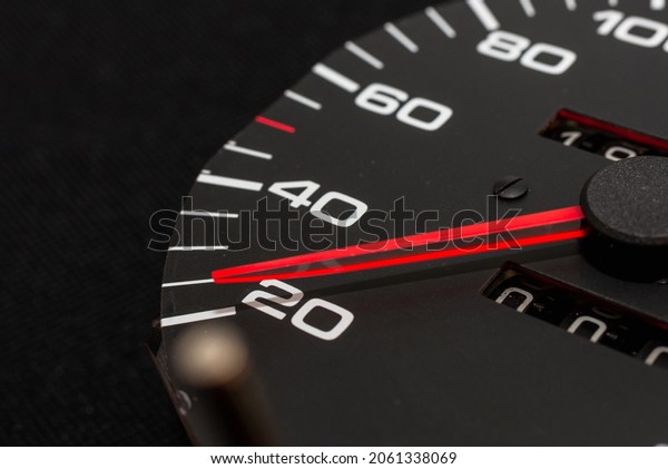 Speedometer in a car. Car dashboard. Dashboard\
details with indication lamps.Car instrument panel. Dashboard with\
speedometer.Car detailing. Modern interior.Closeup.Copy\
space.