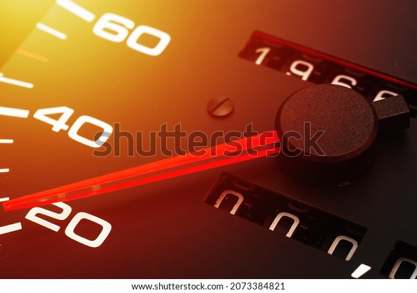 Speedometer in a car. Car dashboard. Dashboard\
details with indication lamps.Car instrument panel. Dashboard with\
speedometer.Car detailing. Modern interior.Closeup.Copy\
space.