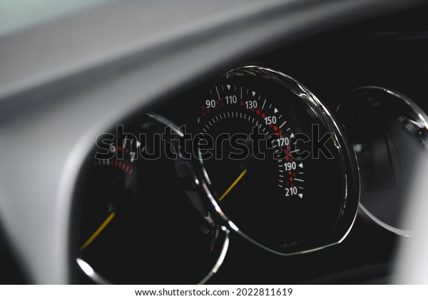 Speedometer in the\
car. Car dashboard. Instrument panel details with indicator lights.\
Car dashboard. Car\
detailing