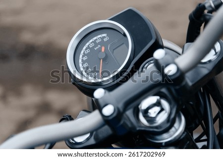 speedometer instruments on front panel of motorcycle