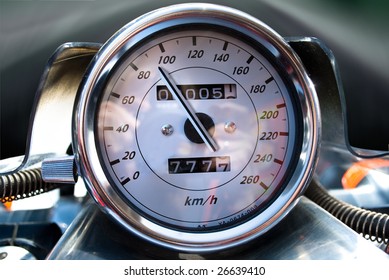 Speedometer Of Motorcycle On A Open Road From Rider Point Of View